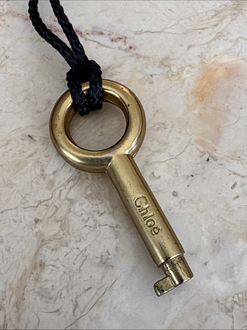 Chloé Paddington Key Pendant Necklace – Authentic Brass Bag Key on Black Cord - Picture 4 of 6